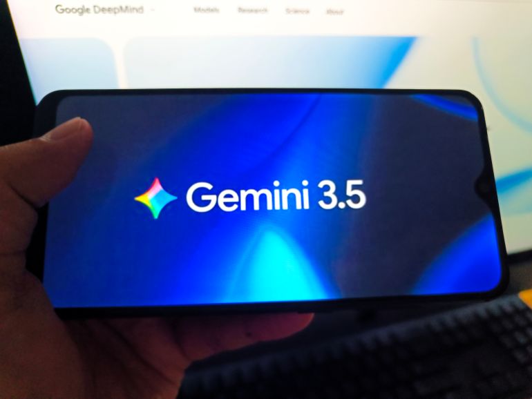 ge3-1779447375 SUQIAN, CHINA - MAY 20, 2026 - A netizen is checking Gemini 3.5 logo on his mobile phone and DeepMind webpage on his computer in Suqian City, Jiangsu Province, China on May 20, 2026. (Photo credit should read CFOTO/Future Publishing via Getty Images)