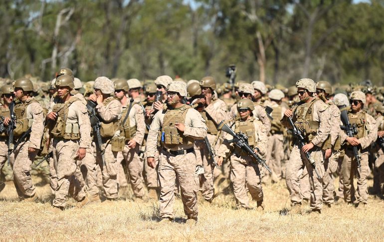 getty_6a5b8db10e-1784384945 TOWNSVILLE, AUSTRALIA - MAY 29: Marines from the United States look on during the opening ceremony of Exercise Southern Jackeroo on May 29, 2026 in Townsville, Australia. Personnel from Australia, the United States, Japan and the Republic of Korea gather at the Townsville Field Training Area near Townsville for the opening ceremony of the largest Australian Army exercise of 2026, which will see more than 3,000 troops train together through 2 July. (Photo by Ian Hitchcock/Getty Images)