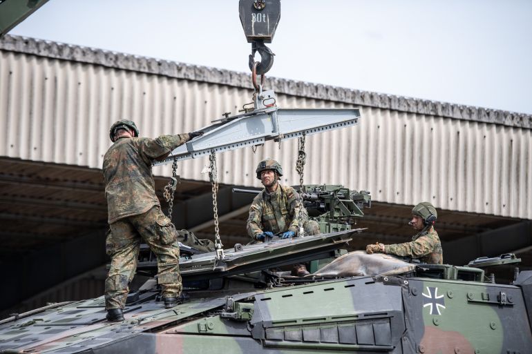 getty_6a7c972a6f-1786550058 UNNA, GERMANY - JUNE 06: German soldiers are seen during a show at Bundeswehr Day on June 6, 2026 in Unna, Germany. The Bundeswehr, the German armed forces, are hosting Bundeswehr Day at locations nationwide in order to give the public insight into Germany's military capabilities. The Bundeswehr is also actively recruiting, as Defence Minister Boris Pistorius is seeking to bolster the number of personnel as part of Germany's larger strategy to expand and modernize its military. (Photo by Hesham Elsherif/Getty Images)