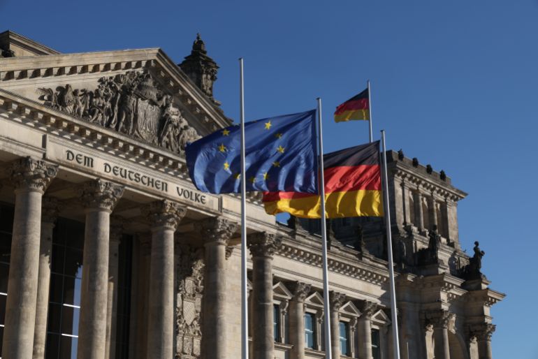 getty_6a84611b93-1787060507 BERLIN GERMANY - MARCH 03: The flags of Germany and the European Union fly outside the Reichstag on March 03, 2026 in Berlin, Germany. The Reichstag is the seat of the Bundestag, Germany's parliament. (Photo by Sean Gallup/Getty Images)