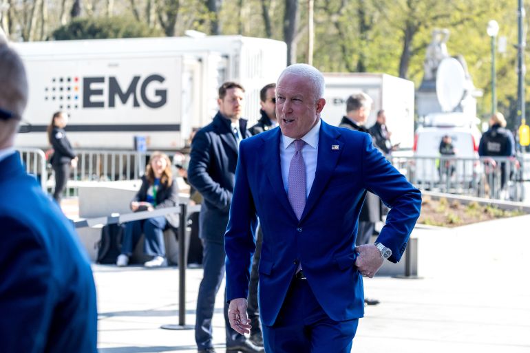 getty_6a8a8e3aae-1787465274 BRUSSELS, BELGIUM - MARCH 22: U.S. Ambassador to Belgium Bill White arrives for a ceremony in the European Quarter on March 22, 2026 commemorating the 10th anniversary of the 2016 terror attacks in Brussels, Belgium. Thirty-two people died and three hundred others were injured during the 2016 suicide-bomb attacks on Brussels Airport and Maalbeek metro station. (Photo by Omar Havana/Getty Images)