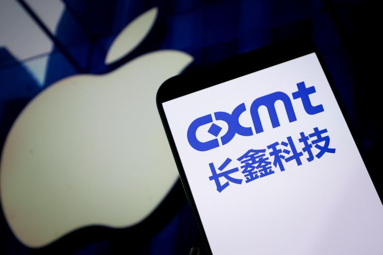 CHONGQING, CHINA - AUGUST 10: In this photo illustration, the logo of ChangXin Memory Technologies (CXMT) is displayed on a smartphone screen with Apple logo in the background on August 10, 2026 in Chongqing, China. (Photo by VCG/VCG via Getty Images)