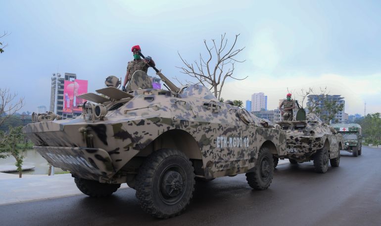 h_56523174-1 epa08844224 (FILE) The Ethiopian National Defence conducts exercises in the inaugural event of Sheger park during a military parade in Addis Ababa, Ethiopia 10 September 2020 (issued 26 November 2020). The prime minister of Ethiopia Abiy Ahmed, on 26 November 2020. ordered the army to move on the embattled Tigray regional capital after a 72 hour ultimatum to surrender had expired. Ethiopia?s military intervention comes after Tigray People's Liberation Front forces allegedly attacked an army base on 03 November 2020 sparking three weeks of unrest. EPA-EFE/STR