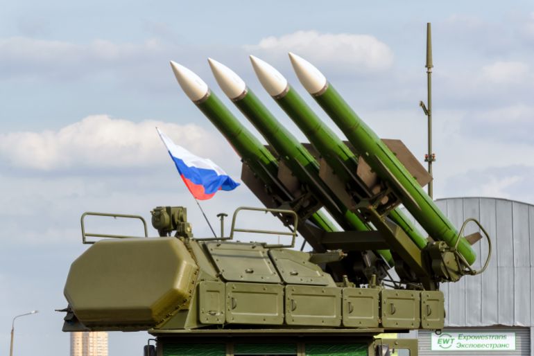 natos-2-1779376015 Russian missile system Buk-M2 at MAKS, modern weapon of Russian army forces. Surface-to-air rockets and Russian flag. Theme of military equipment, army and war in Ukraine. Russia - Aug 28, 2015