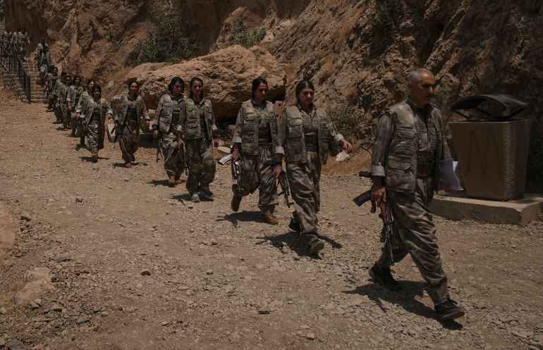 pkk-pics2-1752248180 SULAYMANIYAH, IRAQ - JULY 11: The first group of PKK terrorists, (listed as a terrorist organization by Turkiye, the U.S. and the EU), lays down and destroys their weapons in Sulaymaniyah, northern Iraq on July 11, 2025. In May, the terror group PKK, decided to dissolve and lay down its arms. The announcement followed a February statement by jailed PKK ringleader Abdullah Ocalan, who called for the dissolution of the PKK and its affiliated groups, urging an end to the armed campaign that has lasted more than four decades. In its 40-year terror campaign against Türkiye, the PKK – listed as a terrorist organization by Türkiye, the US, and EU – has been responsible for the deaths of over 40,000 people, including women, children, infants and the elderly. ( Stringer - Anadolu Agency )