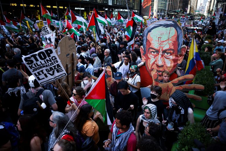 protest-gaza3-1758925201 People attend a protest against Israeli Prime Minister Benjamin Netanyahu, as he delivers an address at the 80th United Nations General Assembly (UNGA) at the U.N. headquarters, in New York, U.S., September 26, 2025. REUTERS/Carlos Barria REFILE - REMOVING "ULTRA-ORTHODOX JEWS FROM THE NETUREI KARTA COMMUNITY".
