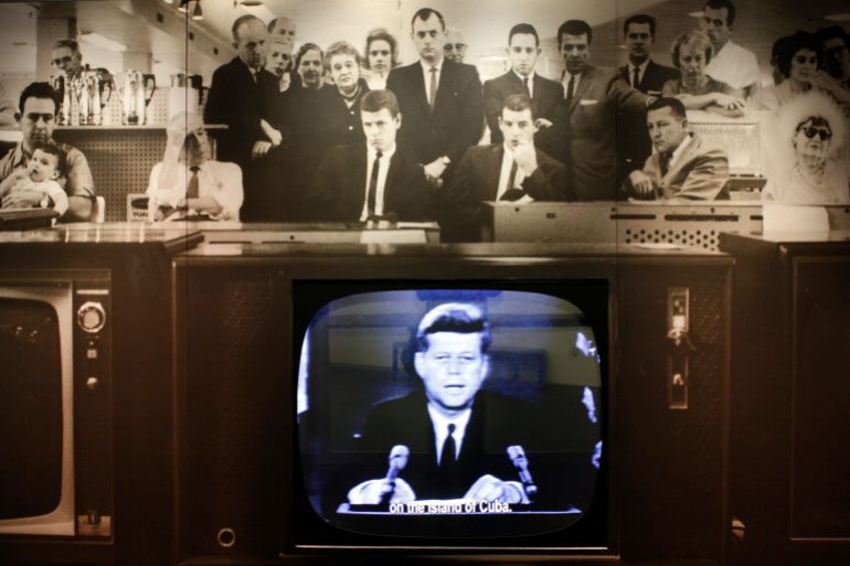 reuters-7788772-1786983560 A display shows excerpts to U.S. President John F. Kennedy's October 22, 1962 televised address about the Cuban Missile Crisis, part of an exhibit titled "To the Brink: JFK and the Cuban Missile Crisis" at the John F. Kennedy Library in Boston, Massachusetts December 18, 2014. U.S. President Barack Obama's announcement on Wednesday to move toward normalizing relations with Cuba was welcomed by younger Cuban-Americans who have increasingly pushed for change and vote Democrat in growing numbers, a contrast to older exiles who believe President John. F. Kennedy - also a Democrat - betrayed them during the failed 1961 Bay of Pigs invasion. REUTERS/Brian Snyder (UNITED STATES - Tags: POLITICS)