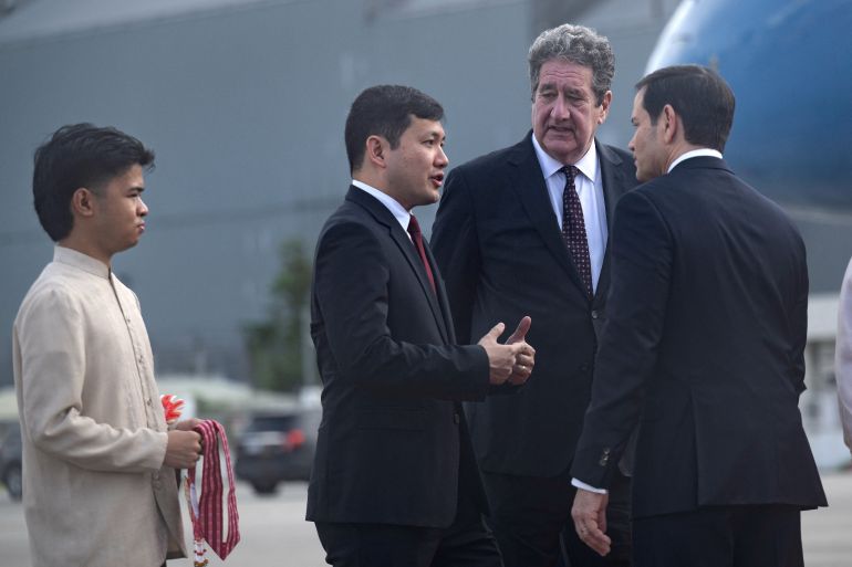 reuters_6a75c142-1786102082 US Ambassador to the Philippines Lee Lipton listens to US Ambassador to ASEAN Kevin Kim speaking with US Secretary of State Marco Rubio upon his arrival at Ninoy Aquino International Airport in Manila on July 21, 2026. BRENDAN SMIALOWSKI/Pool via REUTERS