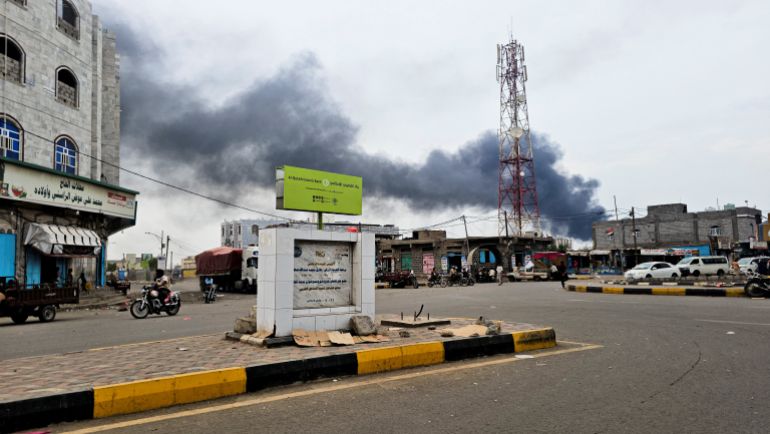 Smoke rises during Houthi missile and drone strikes on the Red Sea port city of Mocha, Yemen, August 9, 2026. Picture taken with a mobile phone. REUTERS/Stringer