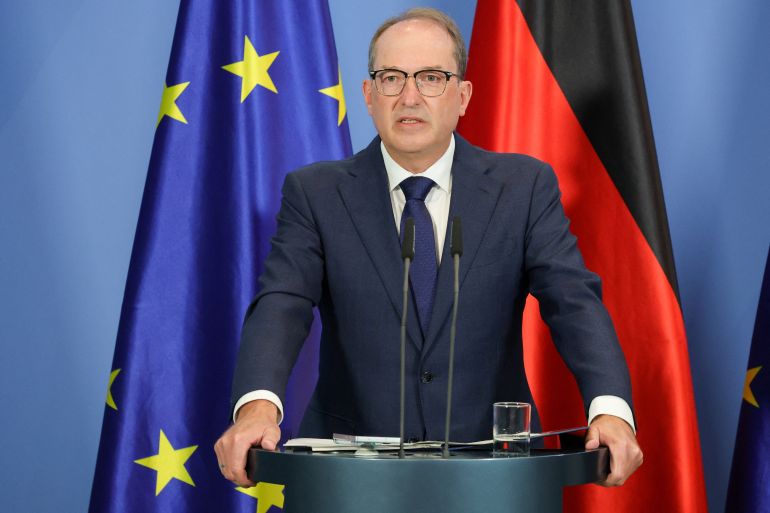 reuters_6a7c9873-1786550387 German Interior Minister Alexander Dobrindt gives a statement on a reform of intelligence agency law in Berlin, Germany, August 12, 2026. REUTERS/Fabrizio Bensch