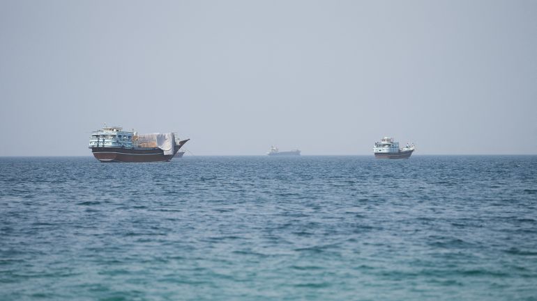 FILE PHOTO: Vessels near the Strait of Hormuz, as seen from Musandam, Oman, August 6, 2026. REUTERS/Stringer/File Photo
