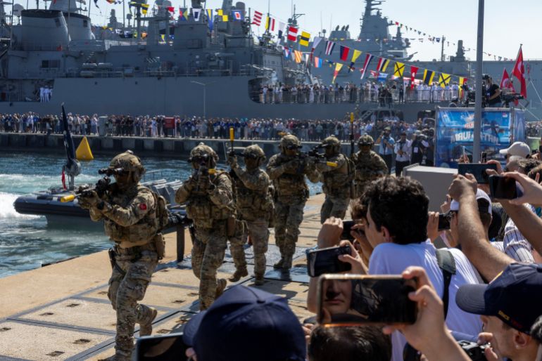 reuters_6a87486a-1787250794 Turkish Navy underwater assault (SAT) commandos perform a drill during a Teknofest Blue Homeland event at the Naval Command in Golcuk, Turkey, August 20, 2026. Teknofest, the country’s largest aerospace and technology festival, is expanding to showcase Turkey’s naval capabilities and advanced technologies in a special maritime-themed edition. REUTERS/Umit Bektas