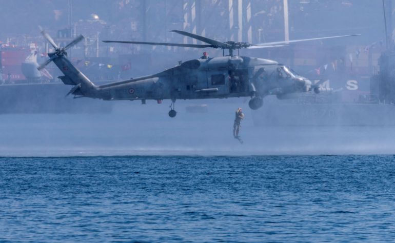 reuters_6a87486f-1787250799 Turkish Navy underwater assault (SAT) commandos perform a drill during a Teknofest Blue Homeland event at the Naval Command in Golcuk, Turkey, August 20, 2026. Teknofest, the country’s largest aerospace and technology festival, is expanding to showcase Turkey’s naval capabilities and advanced technologies in a special maritime-themed edition. REUTERS/Umit Bektas