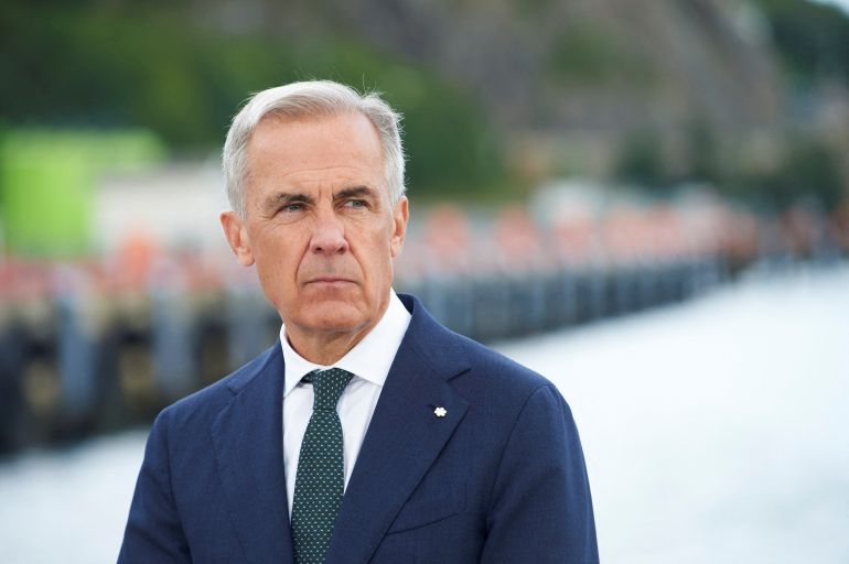 Canadian Prime Minister Mark Carney attends the announcement of a Quebec-Newfoundland hydro agreement in St. John’s, Canada, August 17, 2026. REUTERS/Greg Locke