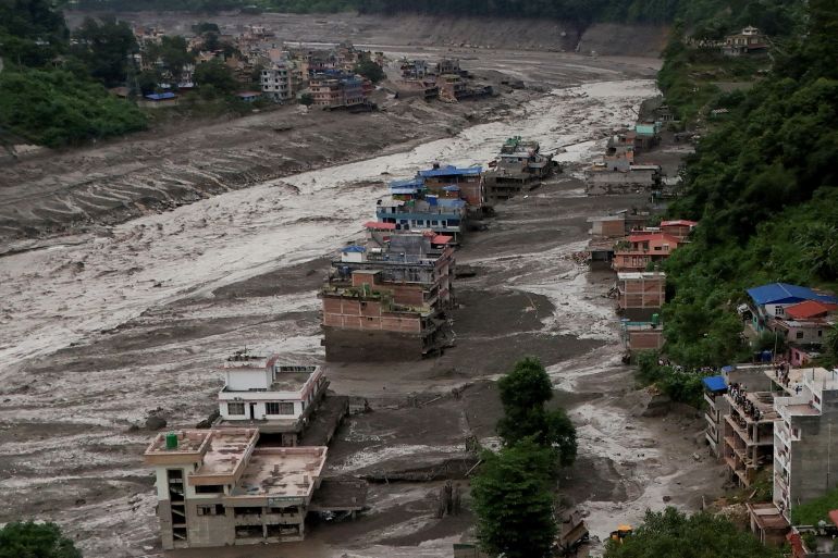 reuters_6a8f02a9-1787757225-1 A drove view of mud covered properties following a flash flood at Trishuli in Nuwakot district, Nepal, August 26, 2026. REUTERS/Navesh Chitrakar TPX IMAGES OF THE DAY