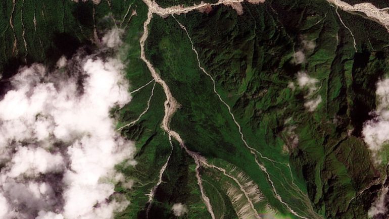 reuters_6a8f3948-1787771208 A satellite image shows the valleys near the Nepal-China border on August 25, 2026, before the devastating floods. 2026 PLANET LABS PBC/Handout via REUTERS THIS IMAGE HAS BEEN SUPPLIED BY A THIRD PARTY. MANDATORY CREDIT.