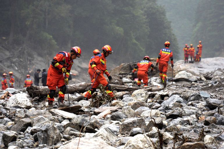 reuters_6a95556e-1788171630 Firefighters conduct search and rescue operations along a river, after a mudslide in Gyirong county, Shigatse, Tibet Autonomous Region, China, August 29, 2026. cnsphoto via REUTERS ATTENTION EDITORS - THIS IMAGE WAS PROVIDED BY A THIRD PARTY. CHINA OUT.