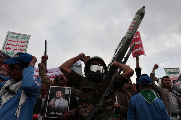 1houthi-missiles-1790589466-1 A demonstrator holds up a mock missile as Houthi supporters rally against the Saudi-led coalition's restrictions on Houthi-controlled areas, which the group describes as a blockade, in Sanaa, Yemen, July 17, 2026. REUTERS/Khaled Abdullah
