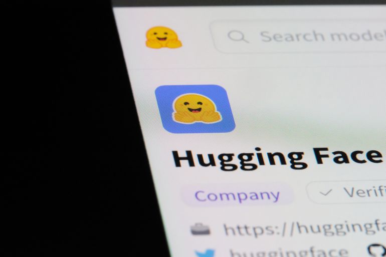Shanghai,China-July 13th 2023: Hugging Face company brand logo; Shutterstock ID 2334340817; purchase_order: سي; job: ; client: ; other: