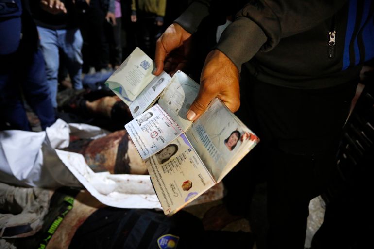 34159601-1712028999 Foreigners working for aid organization killed in Israeli airstrike on Deir al-Balah city- - DEIR AL BALAH, GAZA - APRIL 02: (EDITORS NOTE: Image depicts death) Passports of the officials working at the US-based international volunteer aid organization World Central Kitchen (WCK), who are killed, are seen after an Israeli attack on a vehicle belonging to WCK in Deir Al-Balah of Gaza on April 02, 2024. At least 4 foreign employees of the organization were killed in the attack as the Government Media Office in Gaza said. (وكالة الأناضول)