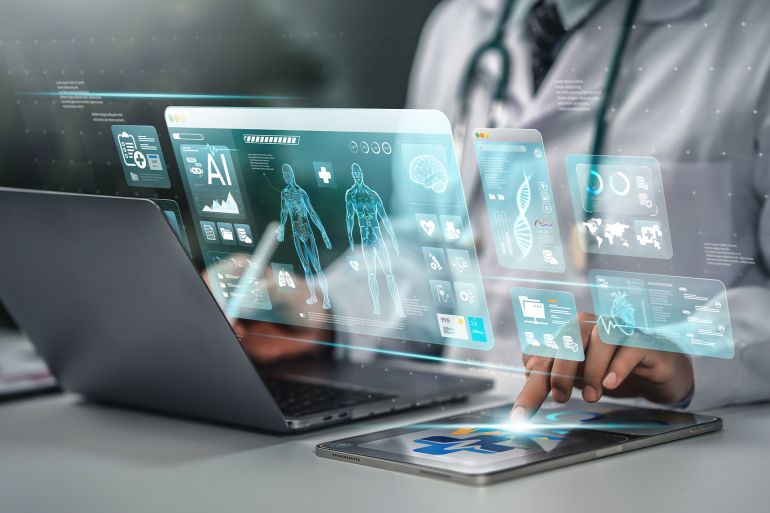 42-1790506565 Doctor photo with hand icon. Medical technology. Doctor using AI technology to diagnose, care and improve accuracy of patient treatment in the future. Medical innovation for future health المصدر AdobeStock