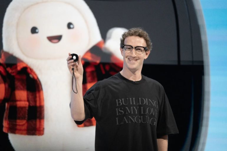 Mark Zuckerberg, chief executive officer of Meta Platforms Inc., reveals the Muse Charm device during the Meta Connect event in Menlo Park, California, US, on Wednesday, Sept. 23, 2026. The event showcases Meta's latest breakthroughs in AI technologies, AI glasses and VR. Photographer: Minh Connors/Bloomberg via Getty Images