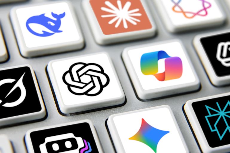 London, UK - 05 10 2025: Artificial Intelligence icons printed and placed on computer keyboard applications ChatGPT, DeepSeek, Gemini, Copilot, Grok, Claude, etc.