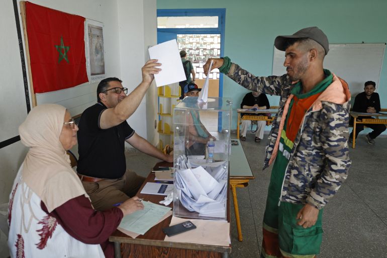 6546-1790189328 A voter casts his ballot during Moroccos parliamentary election at a polling station set up inside a school in the Youssoufia neighborhood of Rabat on September 23, 2026. Moroccans headed to the polls on September 23 to elect a new parliament, with voters focused on the cost of living, employment and inequality amid widespread distrust of political parties. (Photo by Abdel Majid BZIOUAT / AFP)