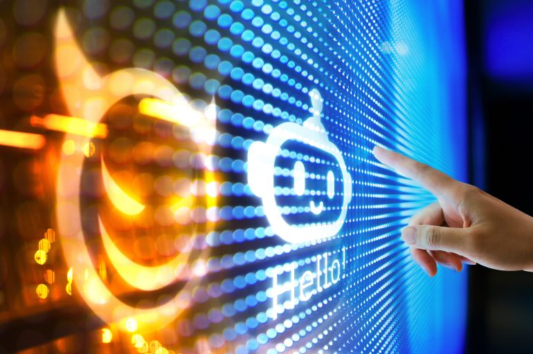 8-1789368494-e1789369236808-1 Woman interacting with ChatGPT AI chatbot against illuminated LED display, with an evil AI hovering over a good AI. Illustrating the ideas around the risks and dangers of Artificial Intelligence. The awareness and careful consideration of its implications