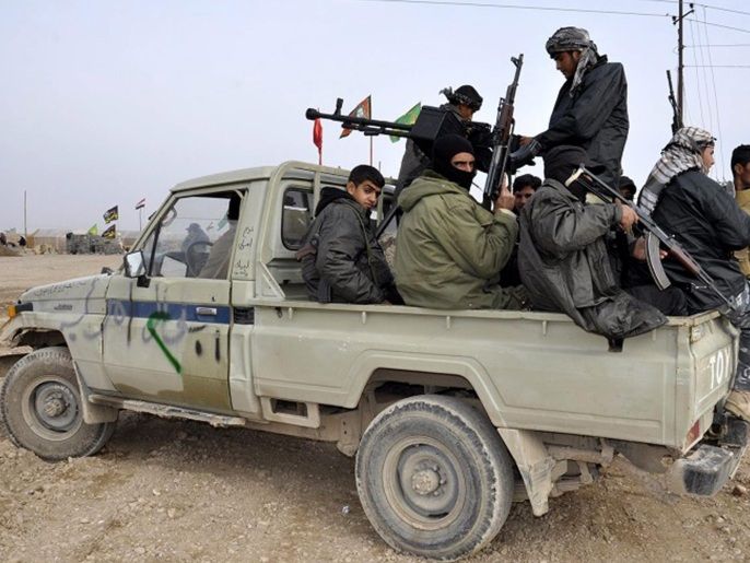 816dc221-90b5-4f73-8fab-e67202e263ee Volunteers from Iraqi Shiite militia take up position near Tikrit city, northern Iraq, 02 March 2015. Iraqi Prime Minister Haider al-Abadi announced on 01 March from Samara city that the security operation to liberate the rest of the areas in Salahuddin from the Islamic State (IS) group militants has begun in the province. Iraqi security forces backed up by militias and tribal fighters launched on 02 March what they said was a major offensive aimed at recapturing the city of Tikrit and other areas north of Baghdad from Islamic State.