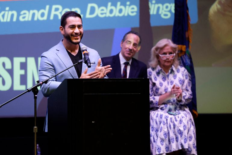 US Democratic Senate candidate from Michigan Abdul El-Sayed speaks while US Representatives Jamie Raskin and Debbie Dingell listen, during a Student Meet and Greet at the Michigan Theatre in Ann Arbor, Michigan, on August 26, 2026. (Photo by JEFF KOWALSKY / AFP)