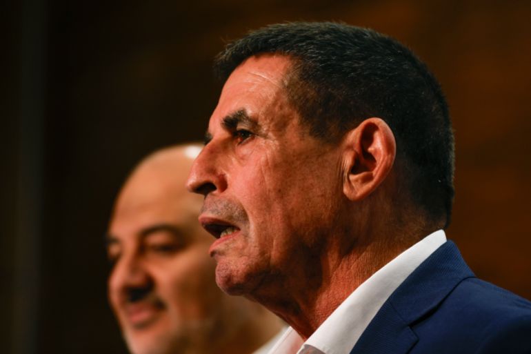 afp_6a96232b9d8e-1788224299 Israeli politician Yoav Segalovitz (R) and leader of the Arab Israeli party Ra'am (United Arab List) Mansour Abbas (back) attend a news conference in Nazareth on August 31, 2026.