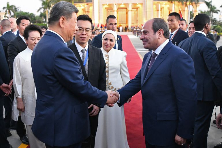 afp_6a991c06356f-1788419078 This handout photograph released by the Egyptian Presidency on September 2, 2026 shows China's President Xi Jinping (L) shaking hands with his Egyptian counterpart Abdel Fattah al-Sisi during Xi's departure from the Cairo International Airport.