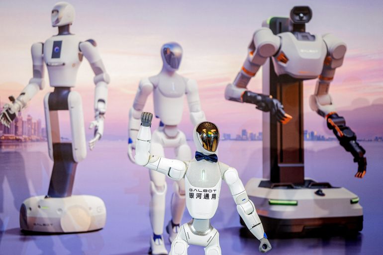 afp_6a9af97becae-1788541307 A Galbot humanoid robot demonstrates its capabilities during the launch of Galbot's unmanned robot convenience store in Hong Kong on August 31, 2026. (Photo by Leung Man Hei / AFP)