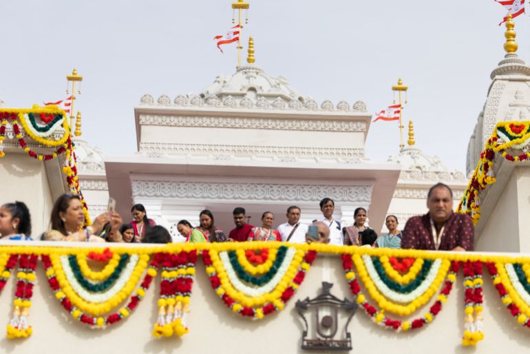 Hindu devotees gather inside the newly consecrated BAPS (Bochasanwasi Akshar Purushottam Swaminarayan Sanstha) Hindu temple in Bussy-Saint-Georges on September 6, 2026.