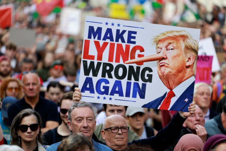 afp_6aa5cb016947-1789250305 People take part in a protest against the visit of US President Donald Trump in the Irish capital Dublin on September 12, 2026.