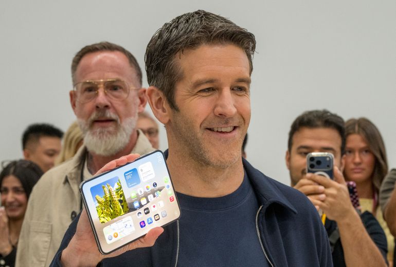New Apple CEO John Ternus shows off an iPhone Duo during an Apple event at the Steve Jobs Theater in Apple Park in Cupertino, California, on September 9, 2026.