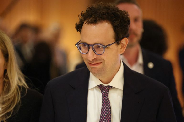 (FILES) Anthropic CEO Dario Amodei looks on after a meeting with French President Emmanuel Macron during the AI Impact Summit in New Delhi on February 19, 2026.