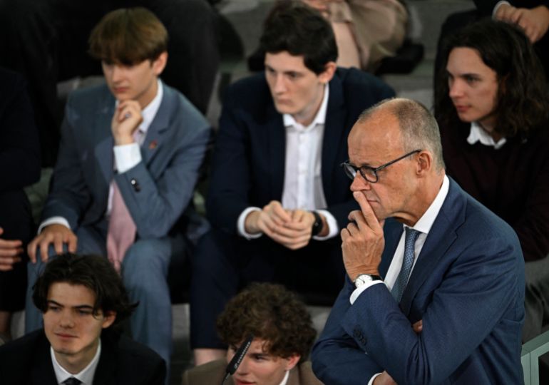 afp_6aa92dbc069e-1789472188 German Chancellor Friedrich Merz listens during a reception of laureates of the federal contest "Jugend forscht" 2026 (Youth researches) at the chancellery in Berlin, on September 15, 2026. (Photo by Tobias SCHWARZ / AFP)