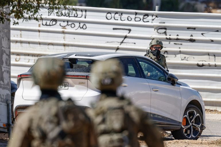 afp_6ab02684aaf7-1789929092 Members of the Israeli forces are seen as they conduct a raid at the H-Clinic Specialized Hospital in Ramallah in the Israeli-occupied West Bank on September 20, 2026, where they arrested a man suspected of killing an Israeli, reported to be a settler, according to Israel's military.