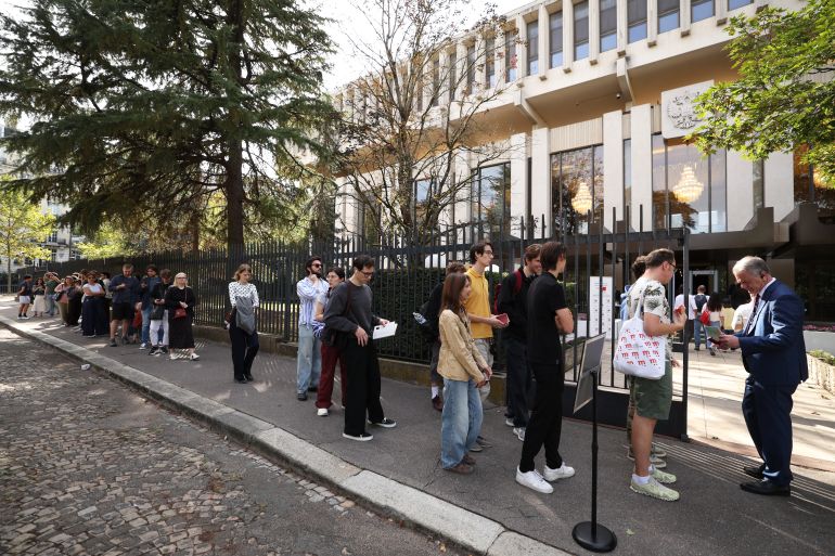afp_6ab0344f6d18-1789932623 Members of the Russian community living in France queue to vote for the Russian State Duma (parliamentary) elections, at the Russian Embassy in Paris on September 20, 2026.