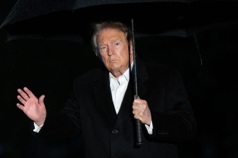 afp_6ab3c7a635c3-1790166950 US President Donald Trump waves after stepping off Marine One on the South Lawn upon arrival at the White House in Washington, DC, in the early hours of September 23, 2026.