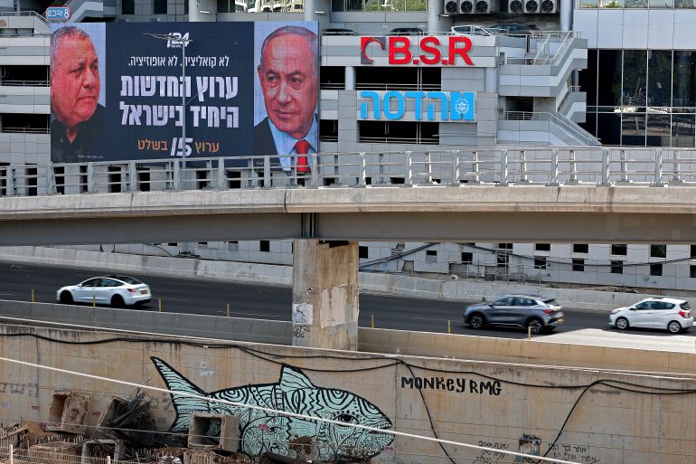 afp_6ab41e21e4d4-1790189089 Cars drive past an advertisement featuring Israel's Prime Minister Benjamin Netanyahu (R) of the Likud party and country's former chief of the general staff and leader of the Yashar centrist political party Gadi Eisenkot, along a street in Ramat Gan on September 23, 2026.