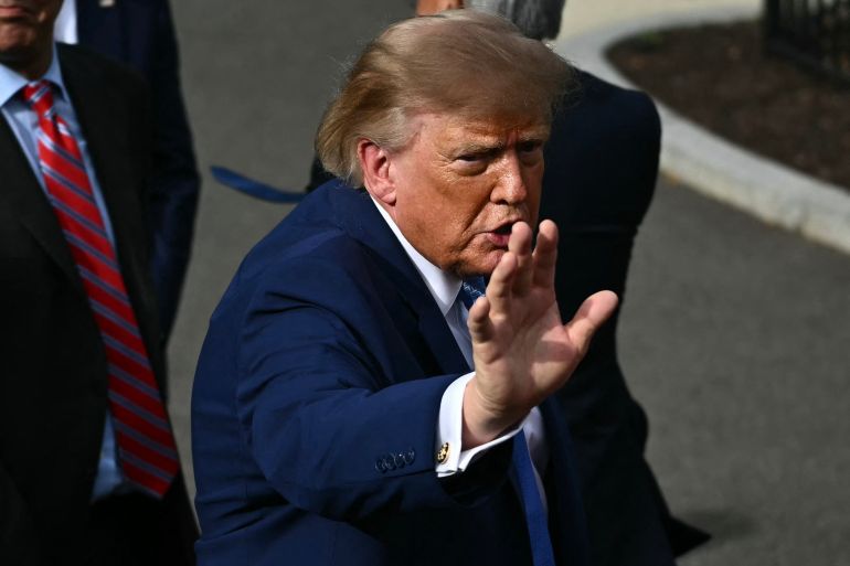 US President Donald Trump gestures after speaking to the press after a meeting with technology executives about artificial intelligence at the White House in Washington, DC, on September 29, 2026.