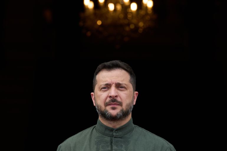 Ukraine's President Volodymyr Zelenskyy arrives to welcome leaders during a Ukrainian and Nordic-Baltic countries summit in Kyiv, Sunday, Aug. 23, 2026. (AP Photo/Francisco Seco)