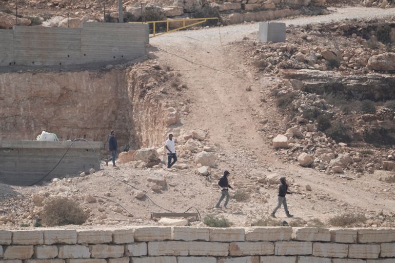 ap_6a9daa5369270-1788717651 Israeli settlers enter Palestinian properties in the occupied West Bank village of Qusra, Saturday, Aug. 29, 2026. (AP Photo/Majdi Mohammed)