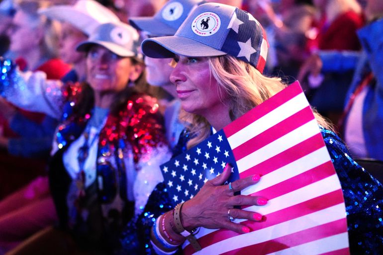 People listen as President Donald Trump speaks at the Republican convention, Wednesday, Sept. 9, 2026, in Dallas. (AP Photo/Julia Demaree Nikhinson)