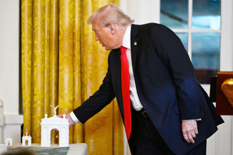 ap_6ab1d594f3558-1790039445 FILE - President Donald Trump speaks about a model of the proposed triumphal arch as he addresses a dinner for donors who have contributed to build the new ballroom at the White House, Oct. 15, 2025, in Washington. (AP Photo/John McDonnell, File)
