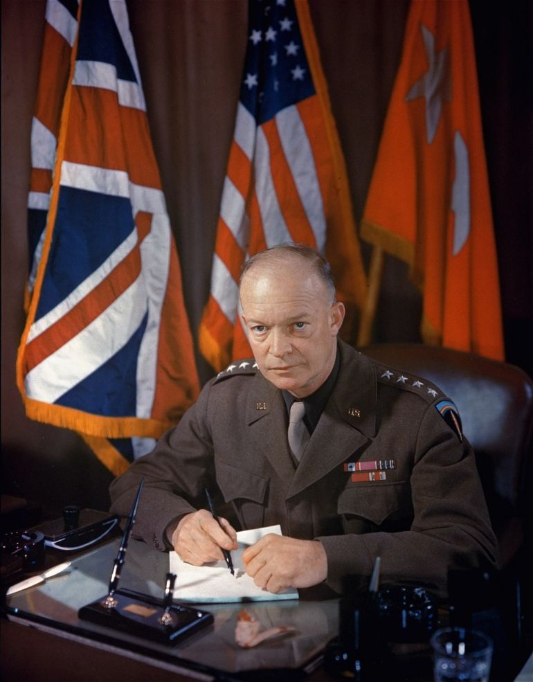 ap_6ab3855263fa7-1790149970 This is a 1945 photo of General Dwight D. Eisenhower seated behind his desk. (AP Photo/stf)