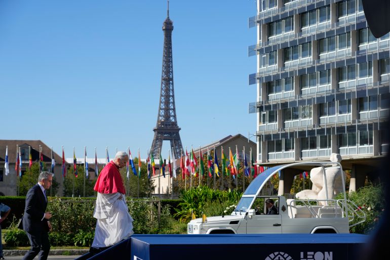 ap_6ab69c40f31cd-1790352449 Pope Leo XIV, followed by Director-General Khaled El-Enany, leaves UNESCO headquarters, Friday, Sept. 25, 2026, in Paris. (AP Photo/Gregorio Borgia)